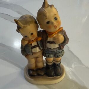 Hummel Figurine with Brown and Cream Tones